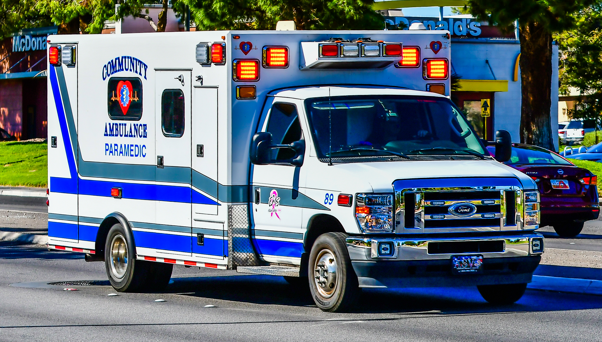 Ambulance responding through town